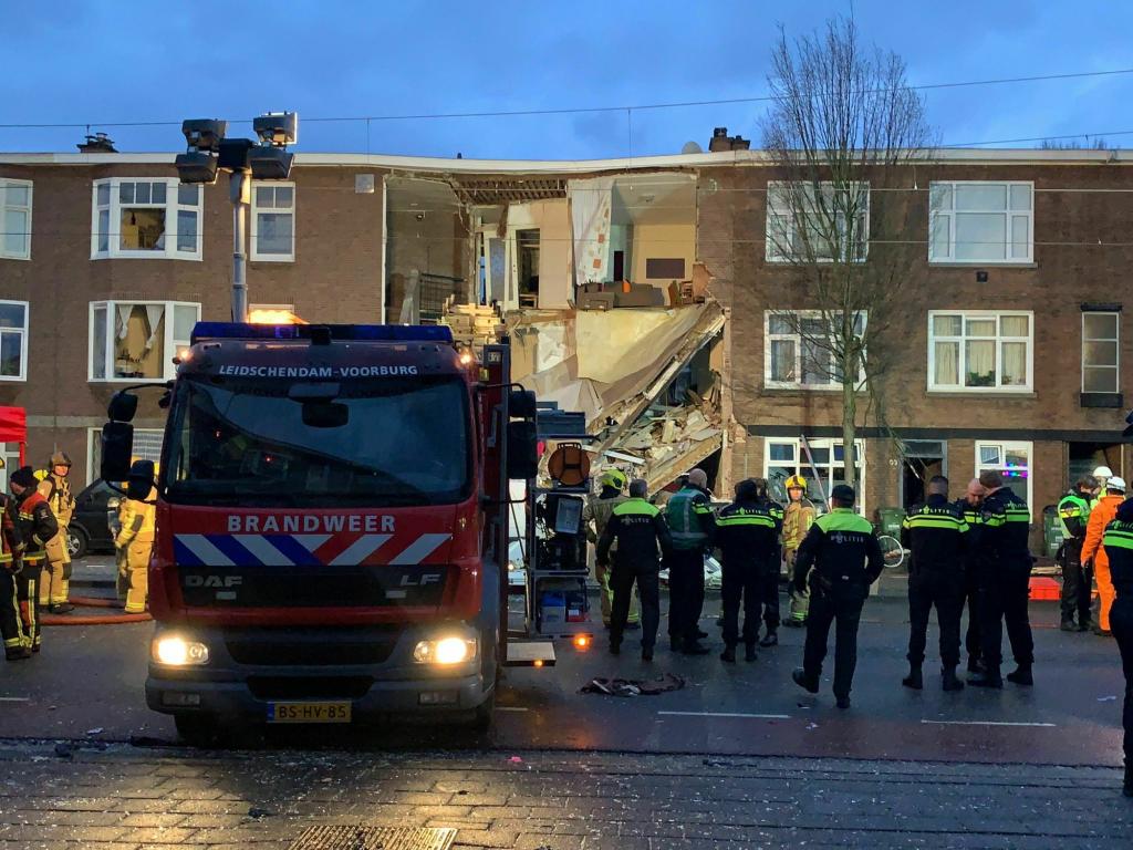 Emergency Service Workers Rescuing People Trapped In Rubble After Gas ...