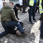 A man is detained after trying to hit Finnish Foreign Minister Timo Soini at the Korson Maalaismarkkinat country fair in Vantaa