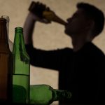 Teenager drinking beer