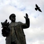 A bird flies past the monument of Soviet World War II commander Ivan Stepanovic Konev in Prague